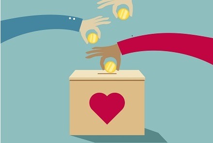 Hands puting coins into donation box: Donate money charity concept